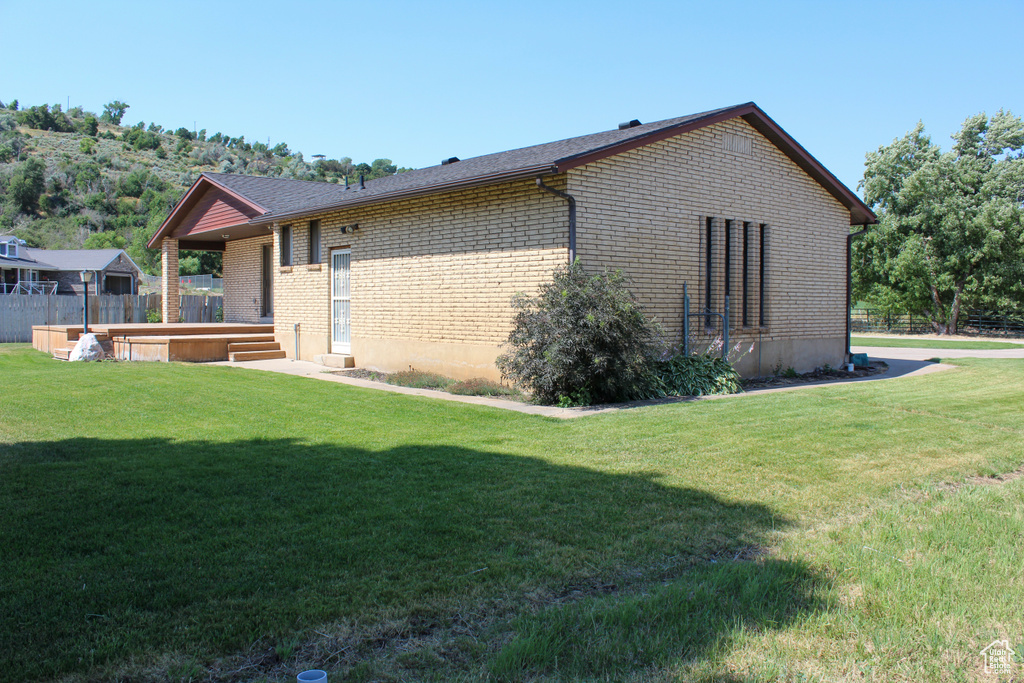 Back of property with brick siding
