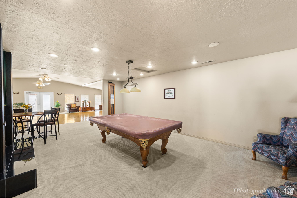 Game room featuring lofted ceiling, billiards, a textured ceiling, recessed lighting, and ceiling fan
