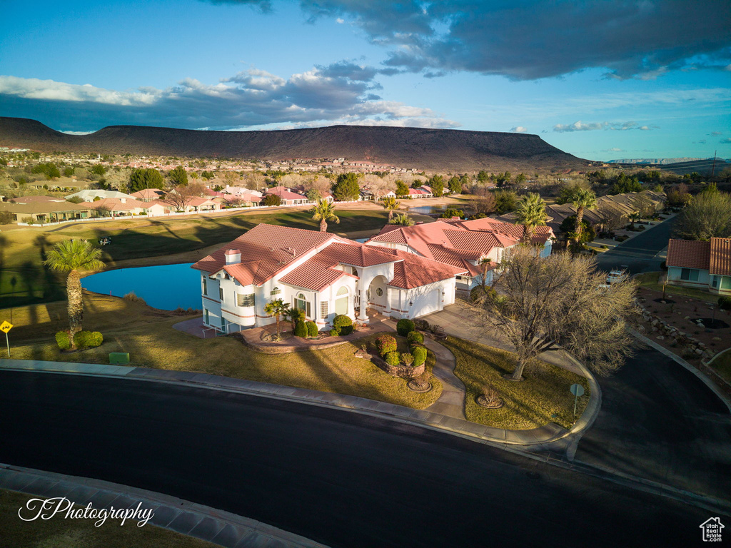 Aerial view of residential area with a water and mountain view