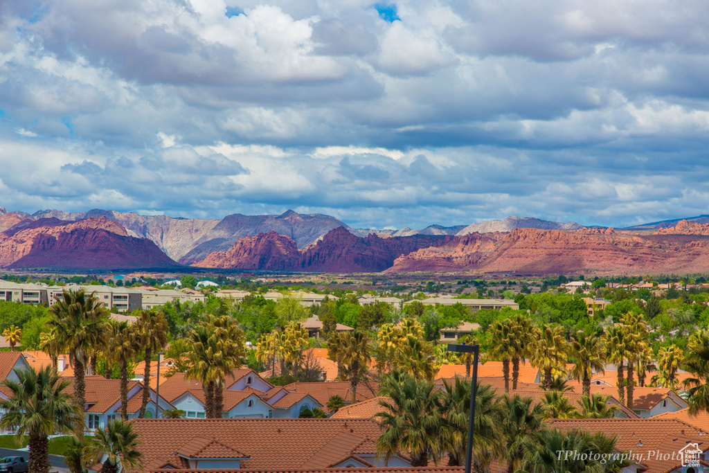 View of mountain background featuring nearby suburban area