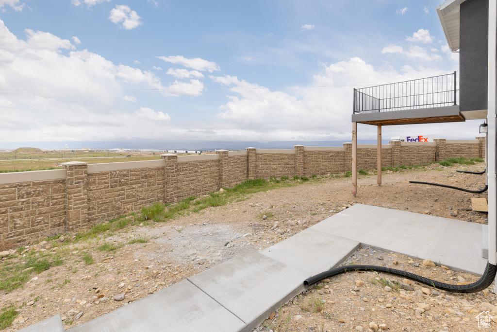 View of fenced backyard
