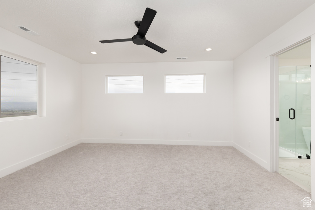 Empty room featuring ceiling fan, carpet, recessed lighting, and baseboards