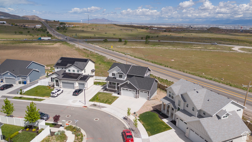 Aerial view of residential area with mountains