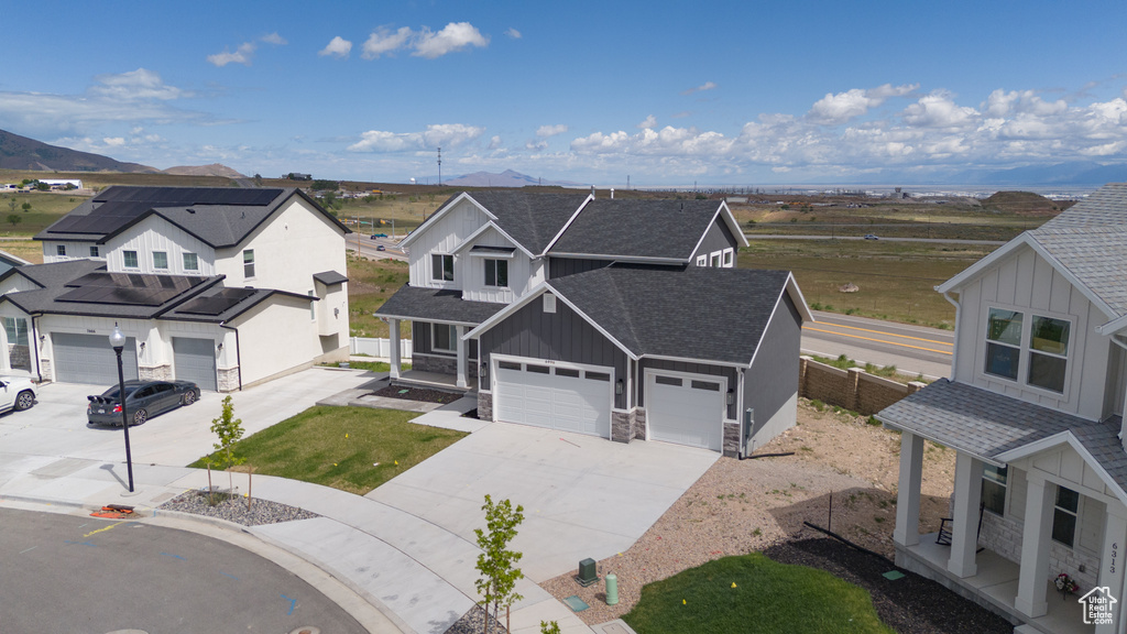 Aerial perspective of suburban area featuring mountains