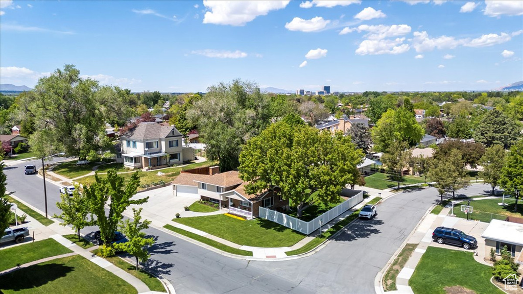 Aerial view of residential area featuring mountains