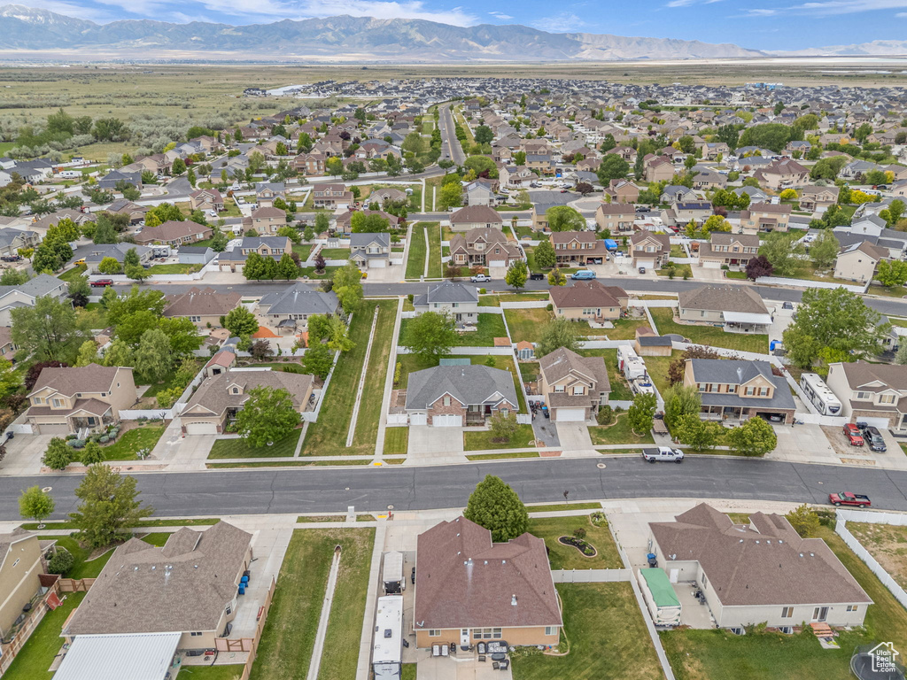 Aerial view of residential area featuring mountains