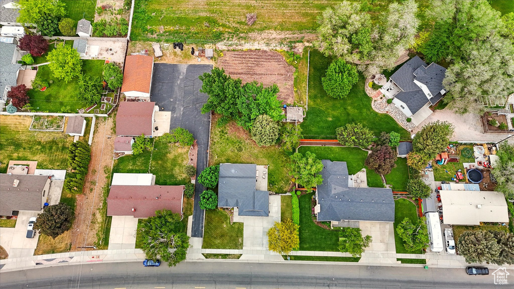 Aerial overview of property\'s location featuring nearby suburban area