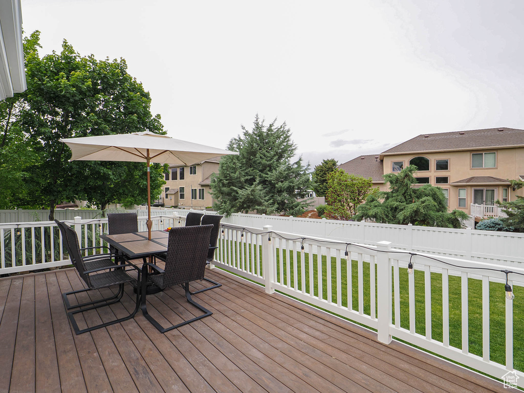 Wooden terrace with outdoor dining space