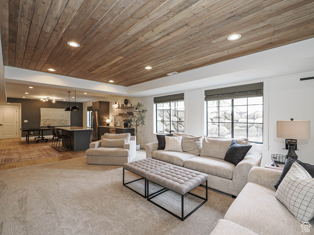 Living area featuring wood ceiling, recessed lighting, and wood finished floors