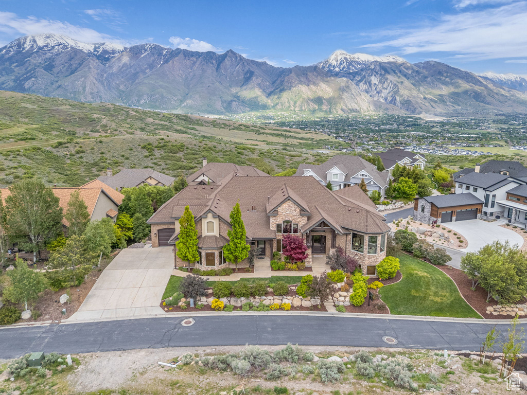 View of mountain background featuring nearby suburban area