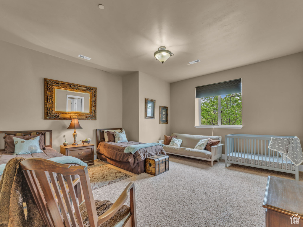 Bedroom with carpet flooring
