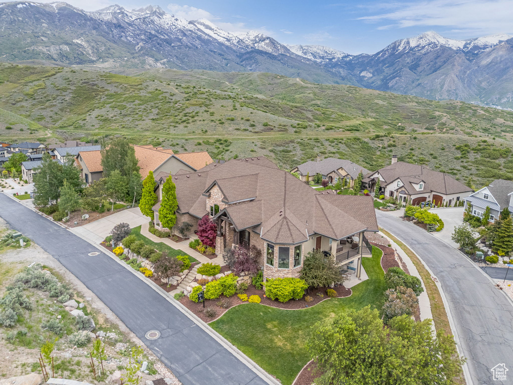 Aerial view of residential area with a mountainous background