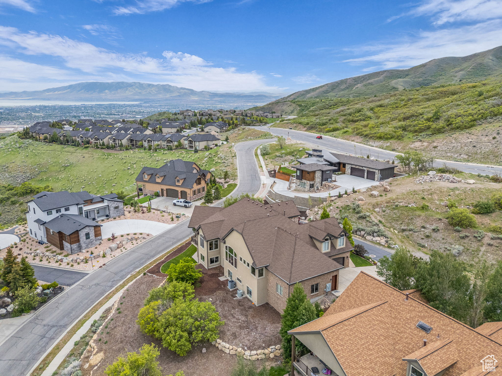 Aerial view of residential area with a mountain backdrop