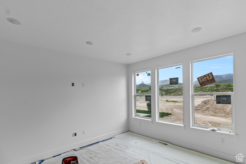 Spare room with baseboards