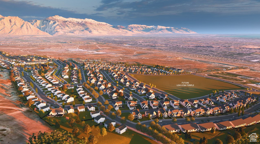 View of property location with a mountainous background and nearby suburban area