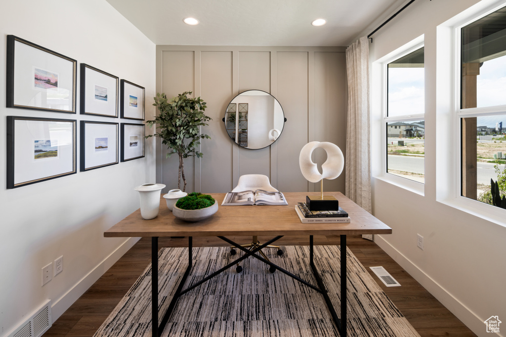 Office space featuring dark wood-type flooring, recessed lighting, and baseboards
