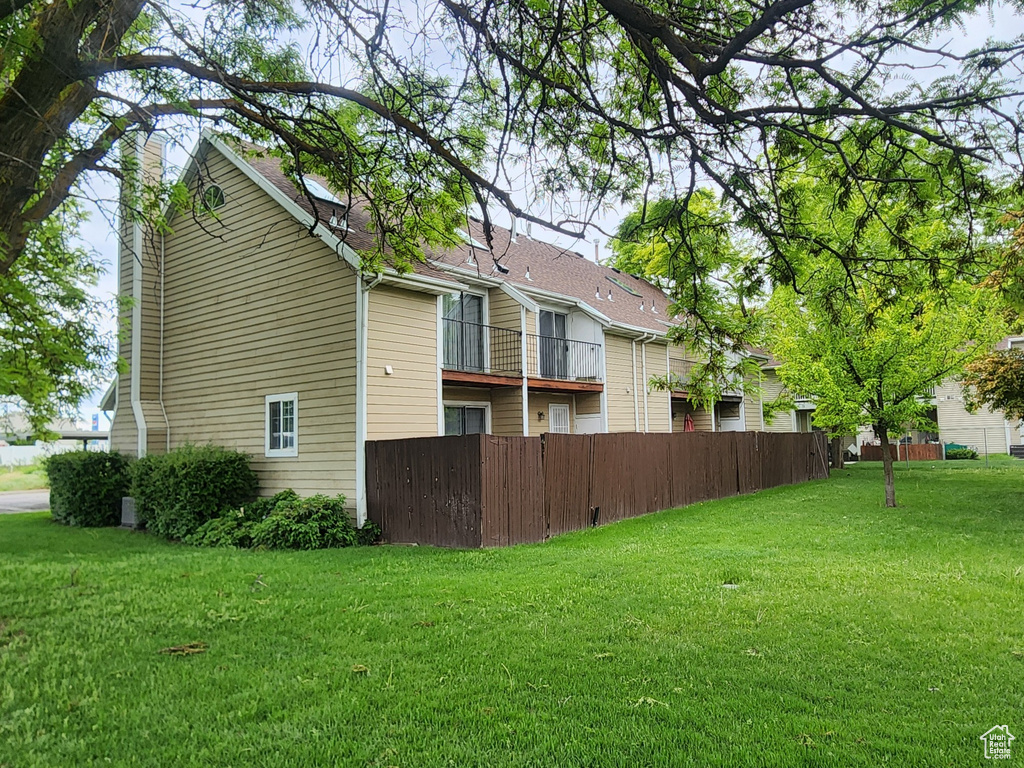 View of side of property featuring a chimney