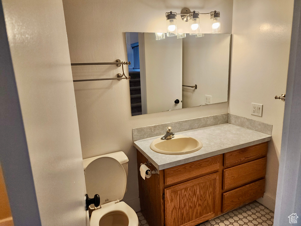 Bathroom featuring toilet and vanity