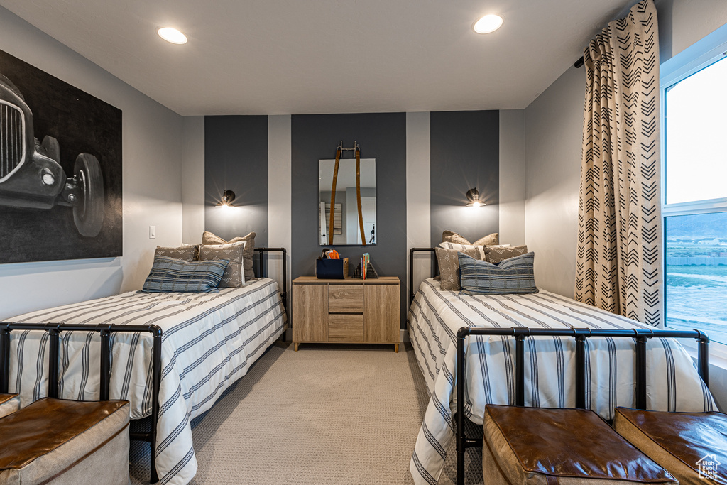 Bedroom featuring light colored carpet and recessed lighting