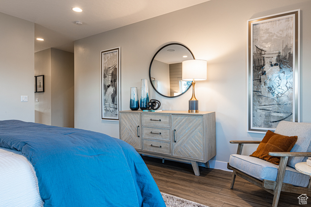 Bedroom featuring dark wood-style floors, recessed lighting, and baseboards
