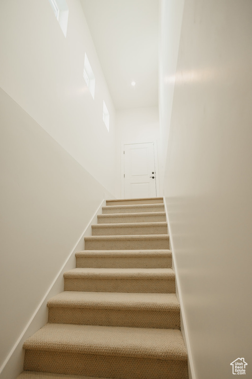Stairs featuring recessed lighting