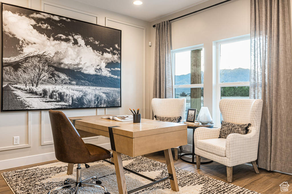 Home office with wood finished floors, recessed lighting, and baseboards