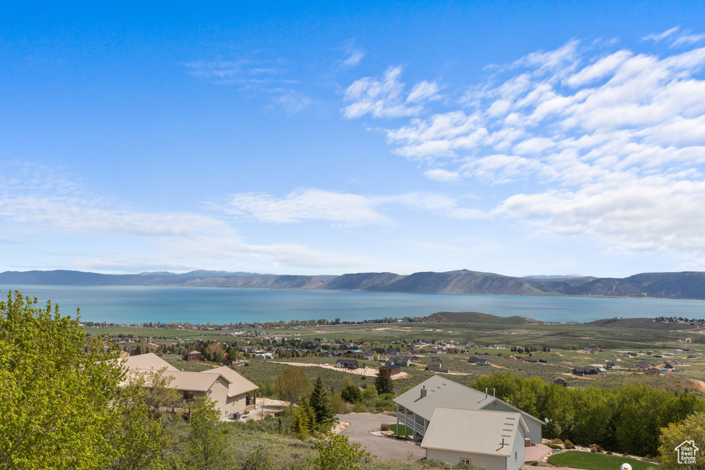 View of mountain backdrop with a large body of water