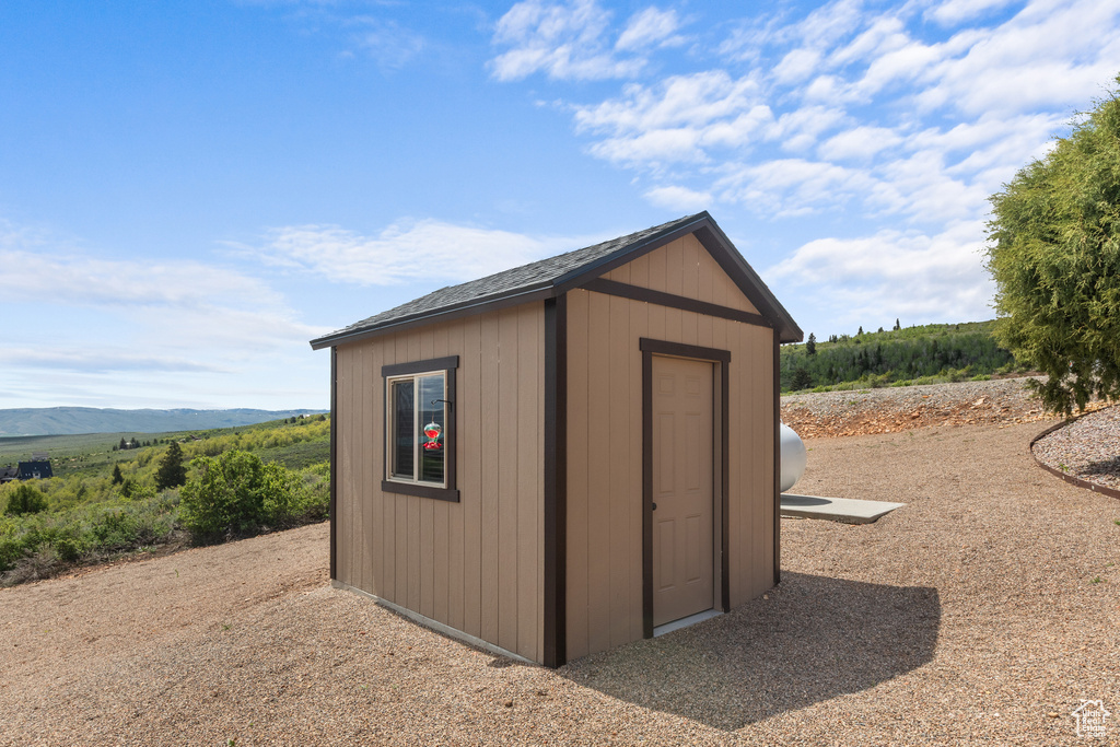 View of shed featuring a mountain view