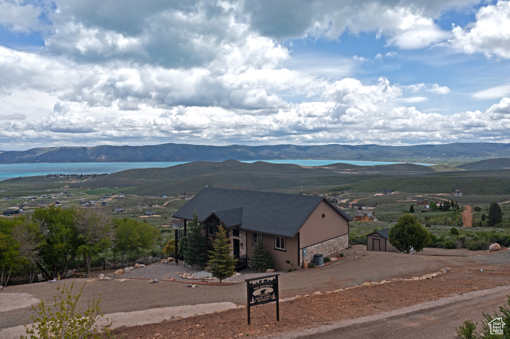Mountain view featuring a nearby body of water
