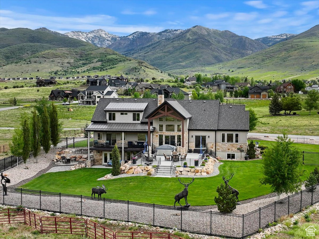 Mountain view featuring nearby suburban area
