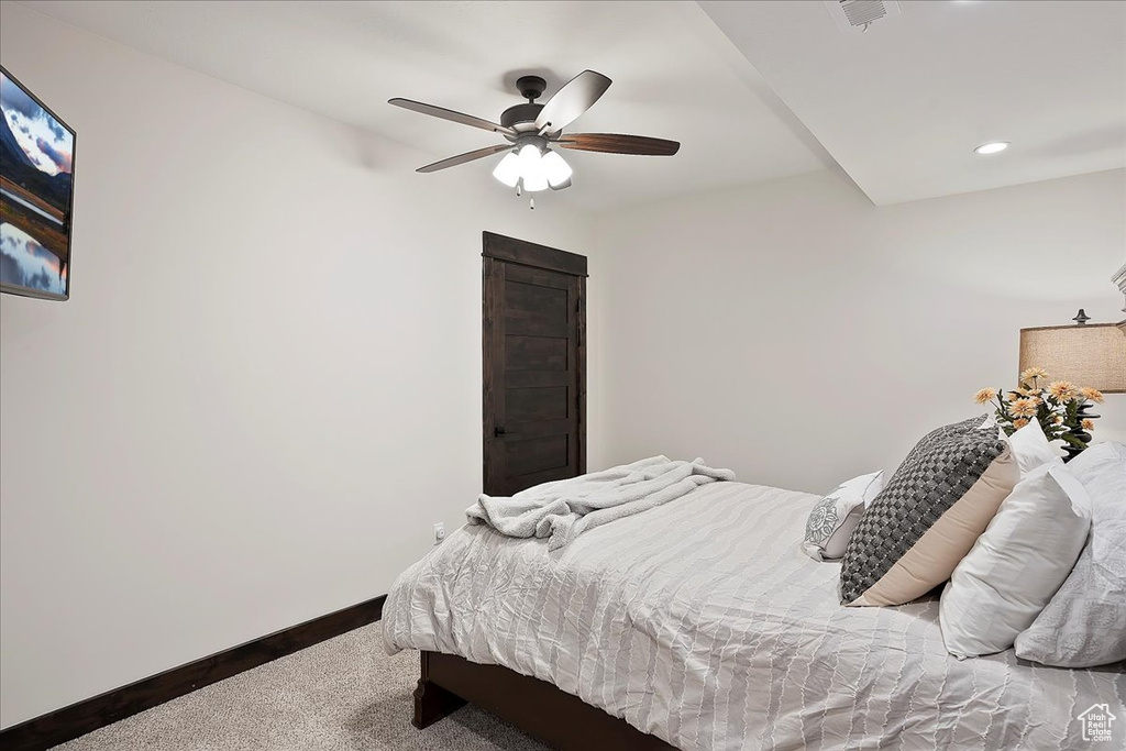 Bedroom with carpet flooring, baseboards, recessed lighting, and ceiling fan