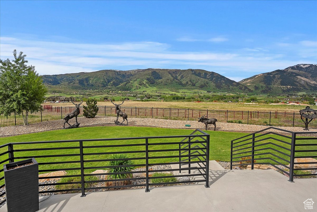 View of mountain backdrop featuring agricultural land and rural landscape