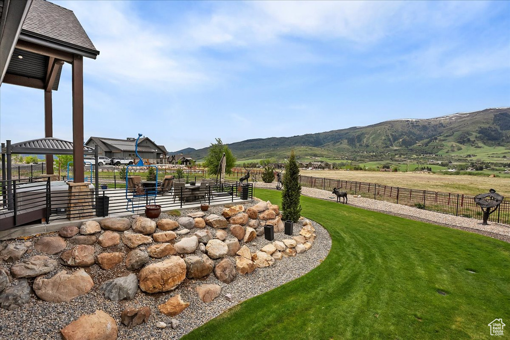 View of yard with a mountain view