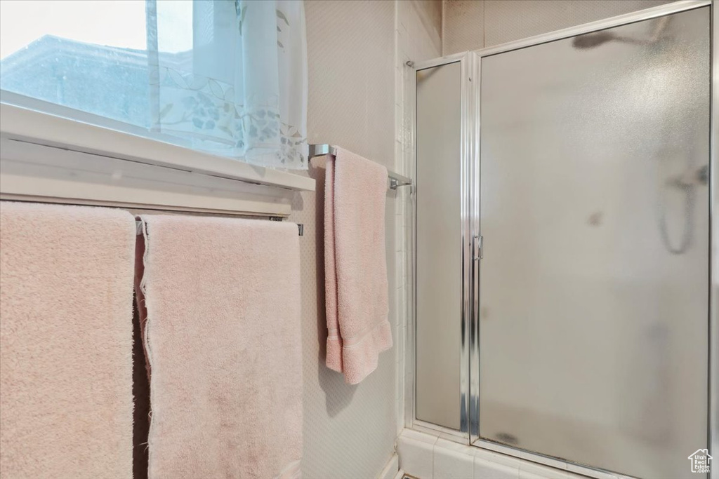 Bathroom featuring a shower stall