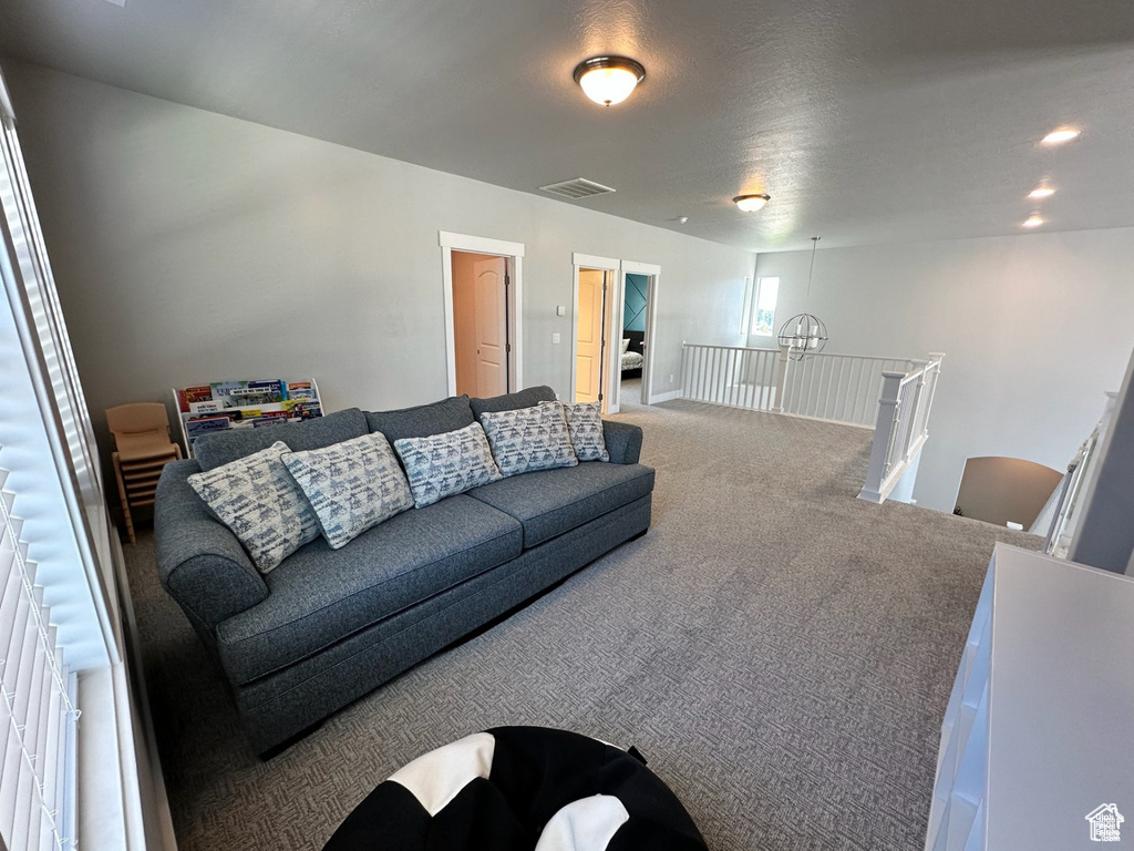 Living room featuring carpet floors