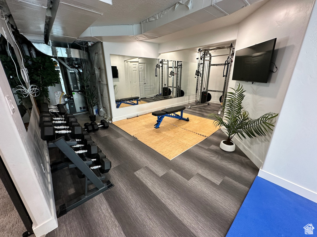 Exercise room featuring baseboards
