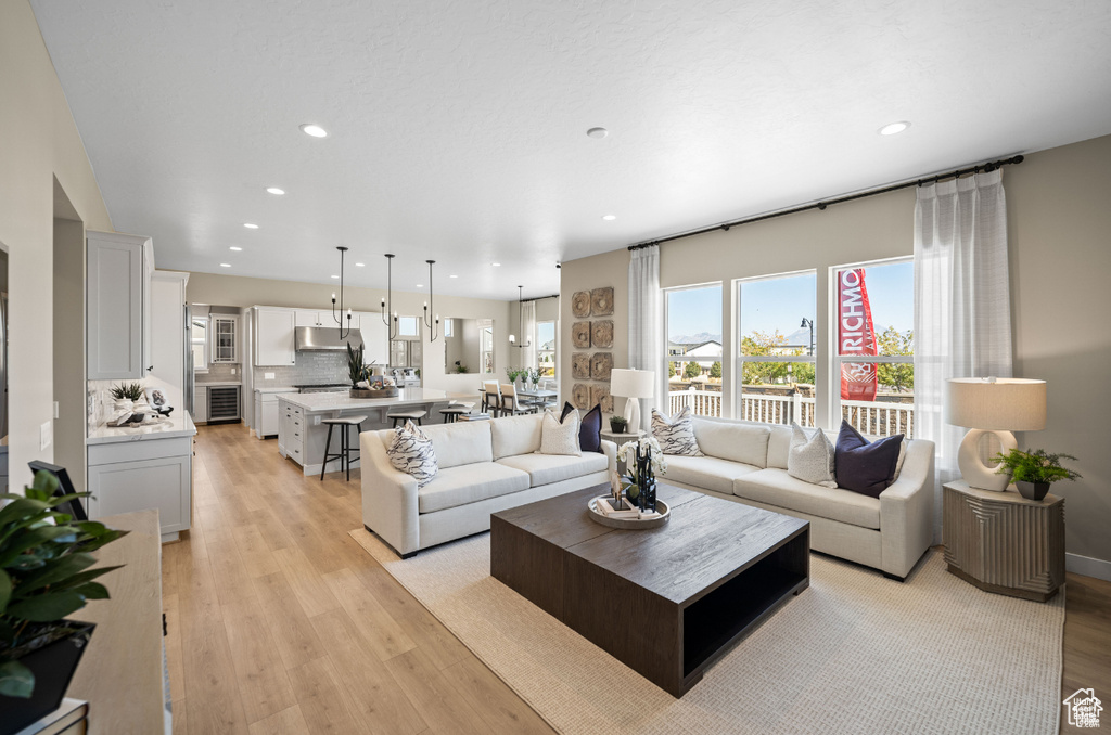 Living room featuring recessed lighting and light wood finished floors
