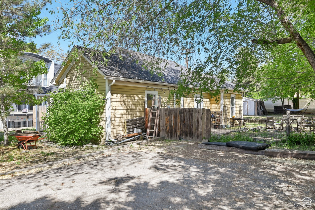 View of property exterior with fence