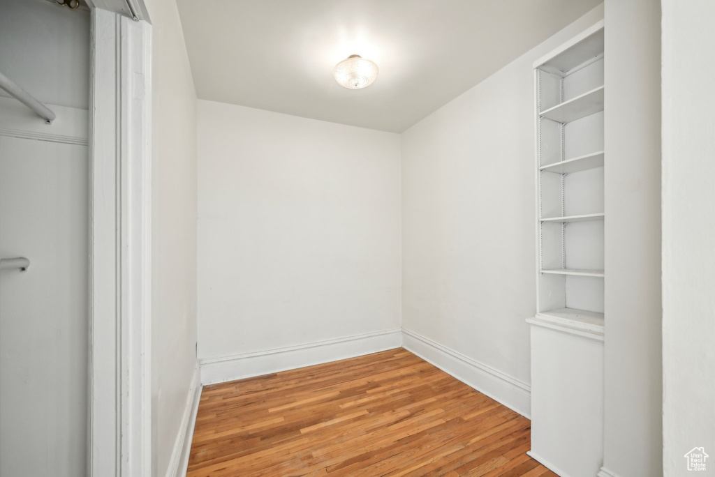 Walk in closet featuring light wood-type flooring