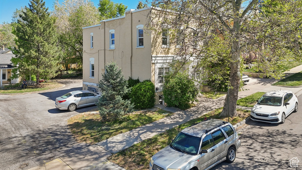 View of front of home with asphalt driveway
