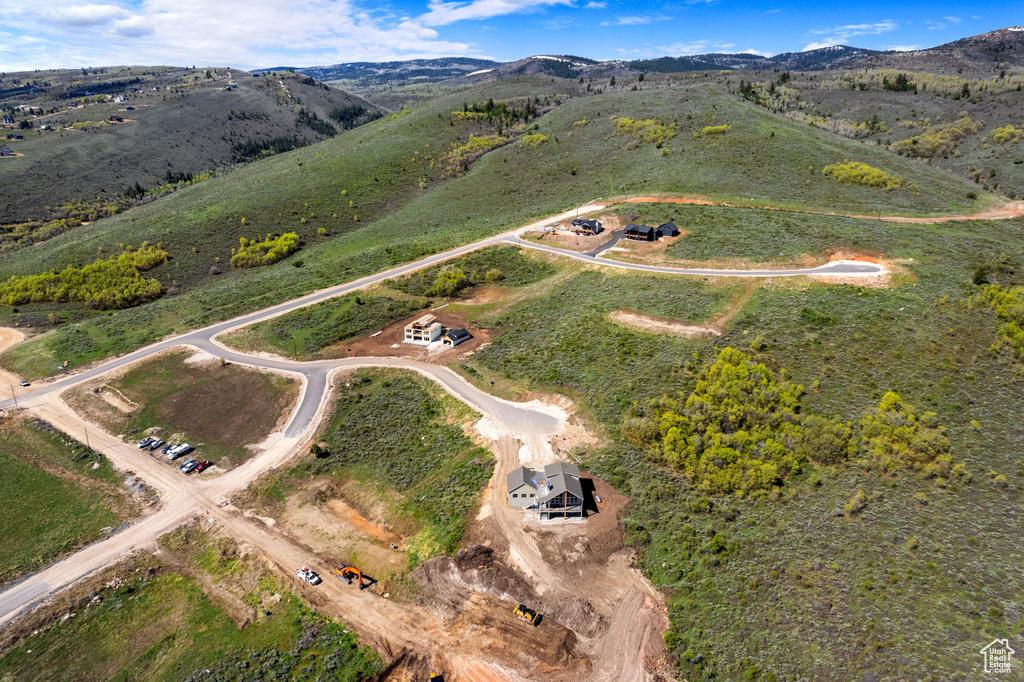 Aerial view of property's location with mountains