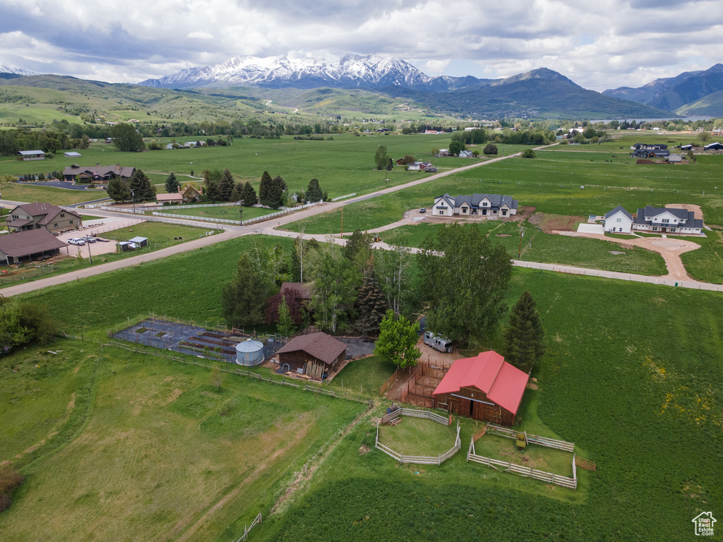 Overview of rural landscape with a mountain backdrop
