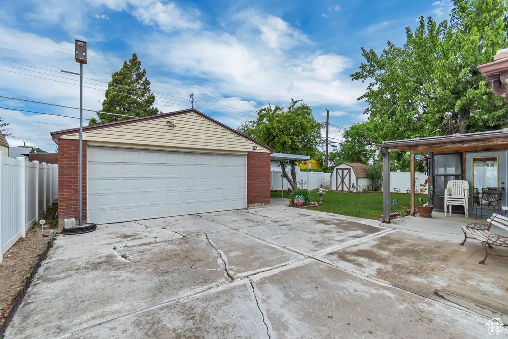 Detached garage with a shed