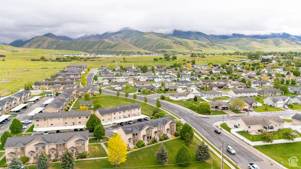 Aerial view of residential area with a mountain backdrop