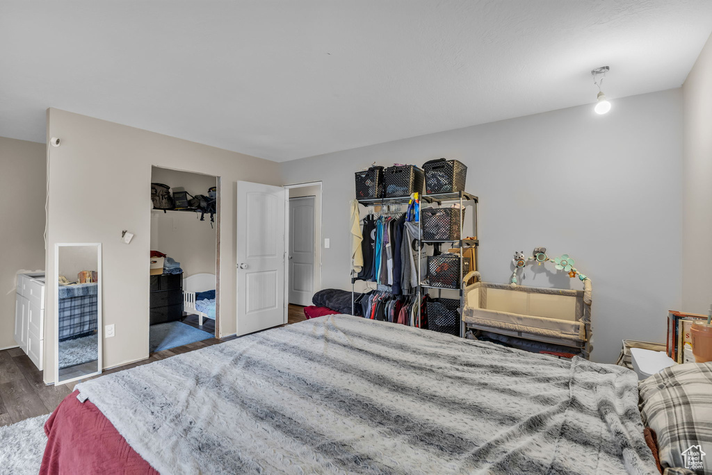 Bedroom featuring wood finished floors