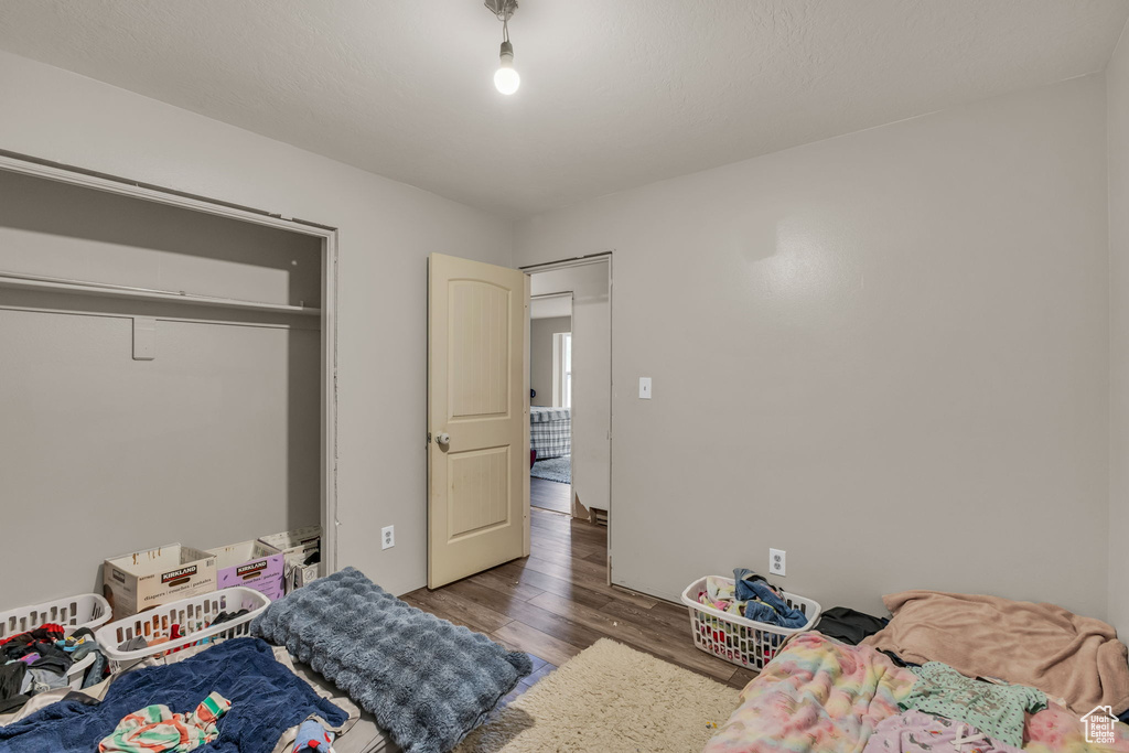 Bedroom featuring wood finished floors