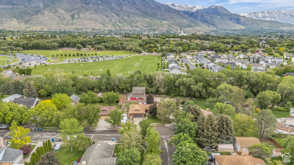 Aerial view of residential area with a mountain backdrop