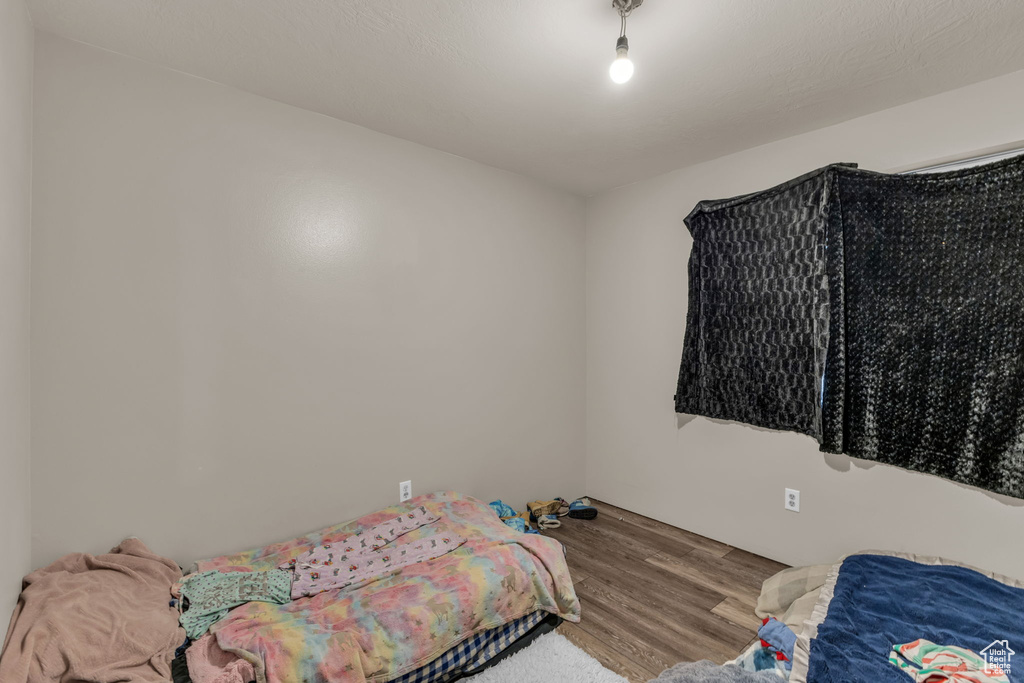 Bedroom featuring wood finished floors