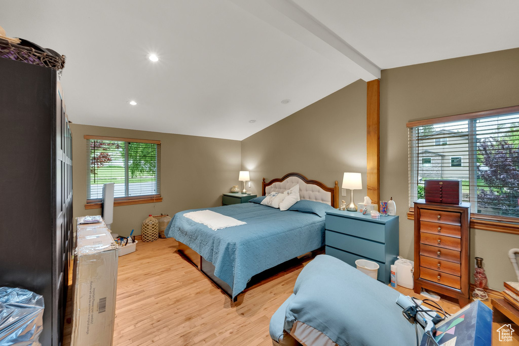 Bedroom with light wood-style floors and recessed lighting