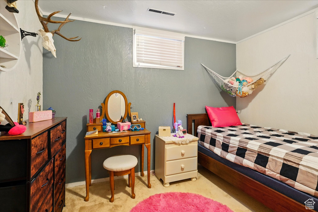 Bedroom with carpet flooring